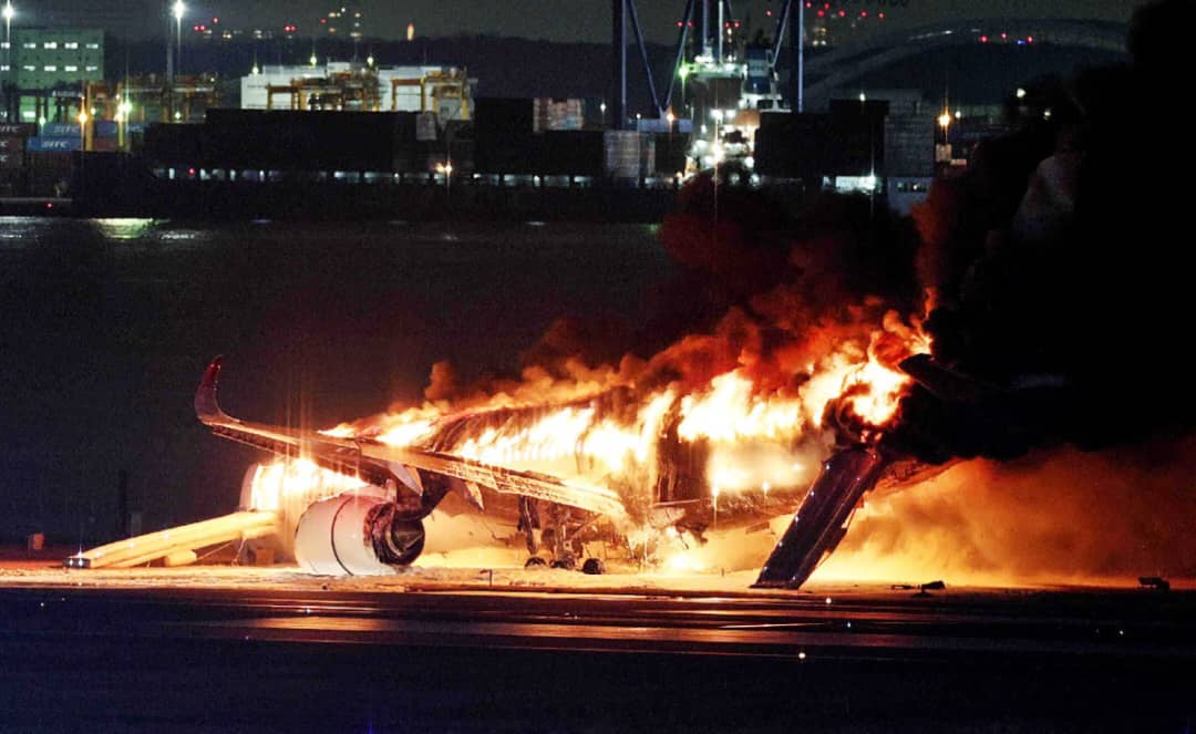 Japan Plane Catches Fire at Tokyo Airport