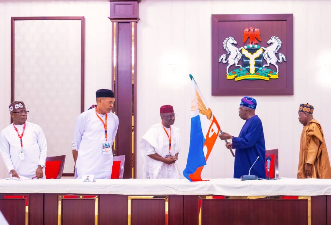 Edo 2024: Tinubu Presents APC Flag to Okpebholo