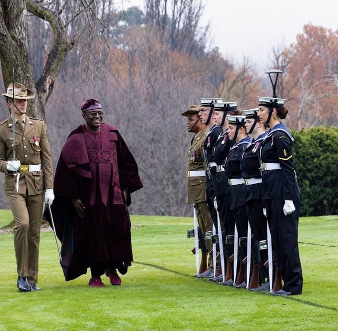 CULTURE 🇳🇬✨: Agbada stands tall among uniformed men in a foreign land, proving Yoruba elegance needs no introduction.