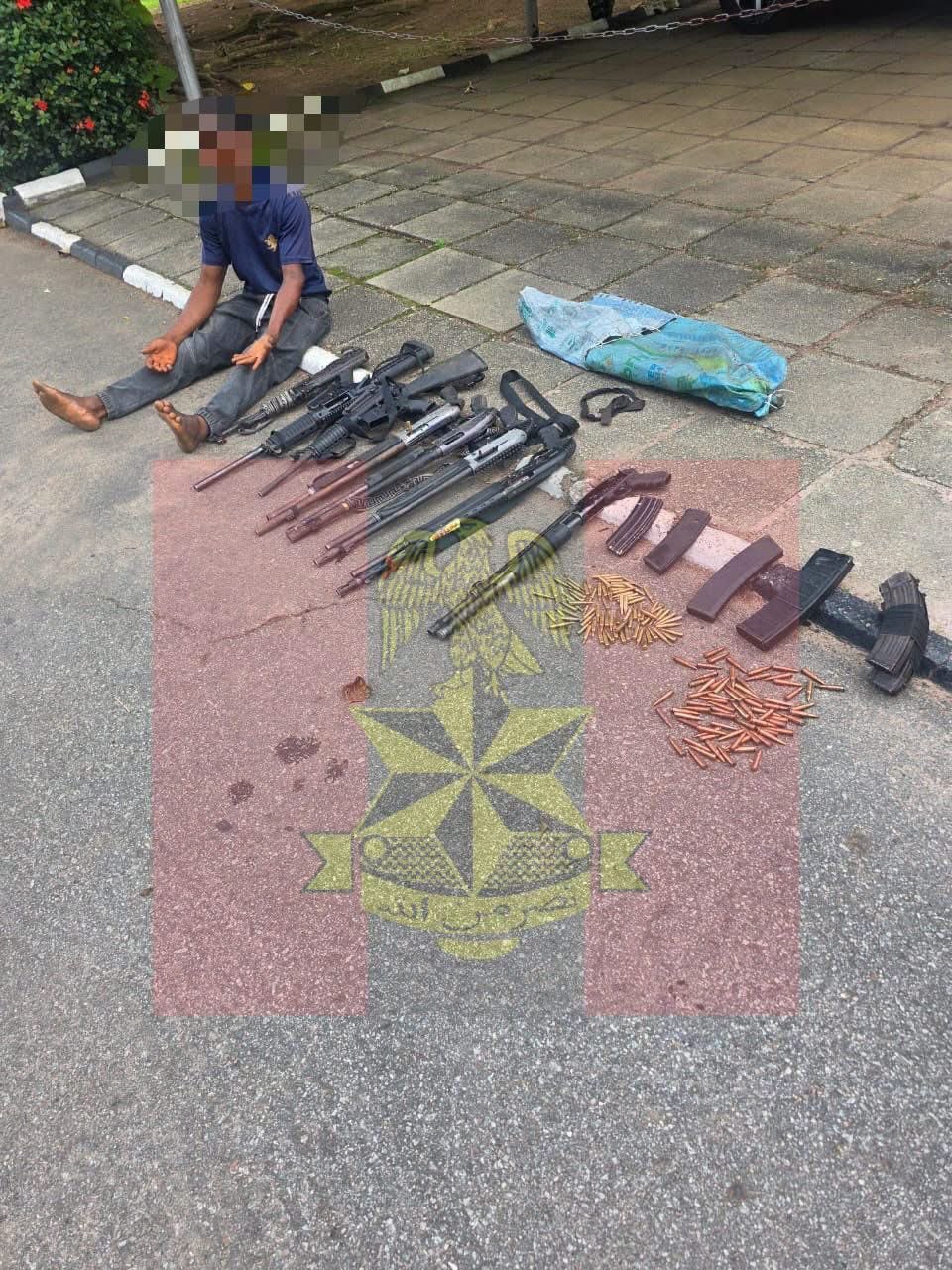 BREAKING 🇳🇬⚔️: Troops Arrest Suspected Armourer, Recover Large Cache of Arms in Imo Forest